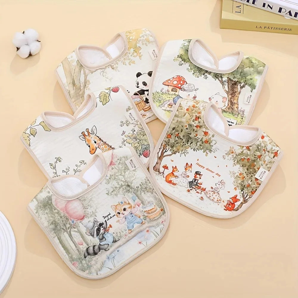 A set of soft cotton waterproof baby bibs featuring woodland animal and nature patterns.