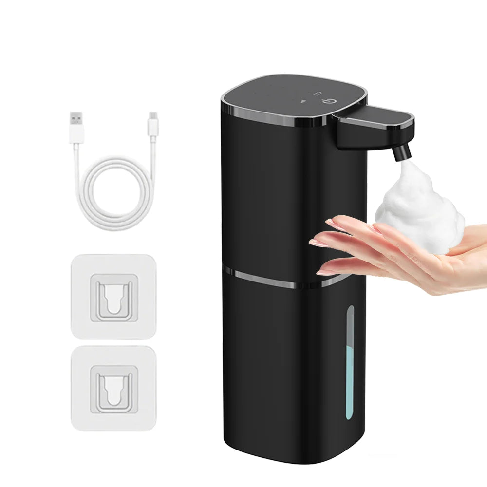 A black touchless infrared smart soap dispenser is shown with a hand dispensing white soap.