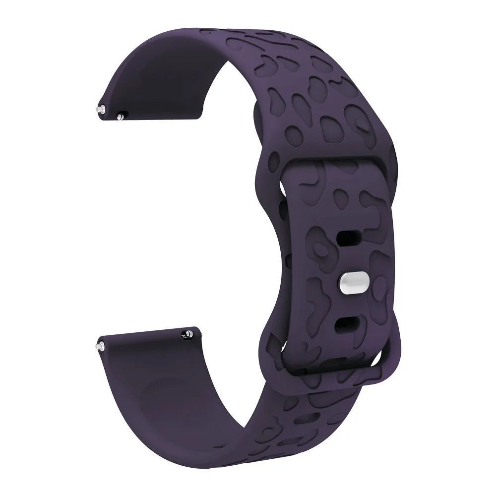 A dark purple silicone watch band with an engraved pattern for a Redmi Watch 5.