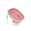 Pink suction cup soap dish with a slanted design and drainage holes.