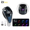 A clear crystal gear shift knob with LED illumination and a silver base, shown alongside various color options.