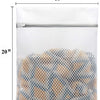 A white mesh laundry bag with a zipper, filled with a mix of light brown and blue spherical items.