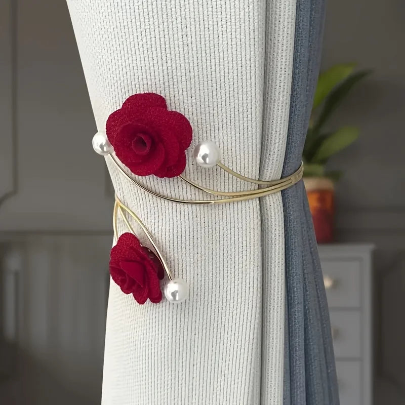 Elegant rose pattern curtain tiebacks featuring red roses and pearl accents on a gold-toned metal design