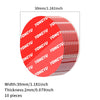 A circular red adhesive pad with text printed on it, shown next to a measurement scale.