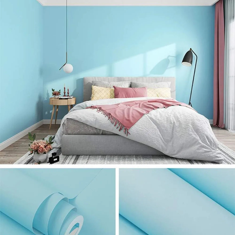 A roll of light blue self-adhesive peel-and-stick wallpaper shown in close-up.