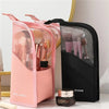 Pink and black waterproof makeup brush holder with a foldable stand for travel
