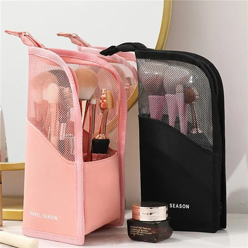 Pink and black waterproof makeup brush holder with a foldable stand for travel