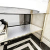 A kitchen cabinet sticker product displayed on a glass shelf with marble flooring.