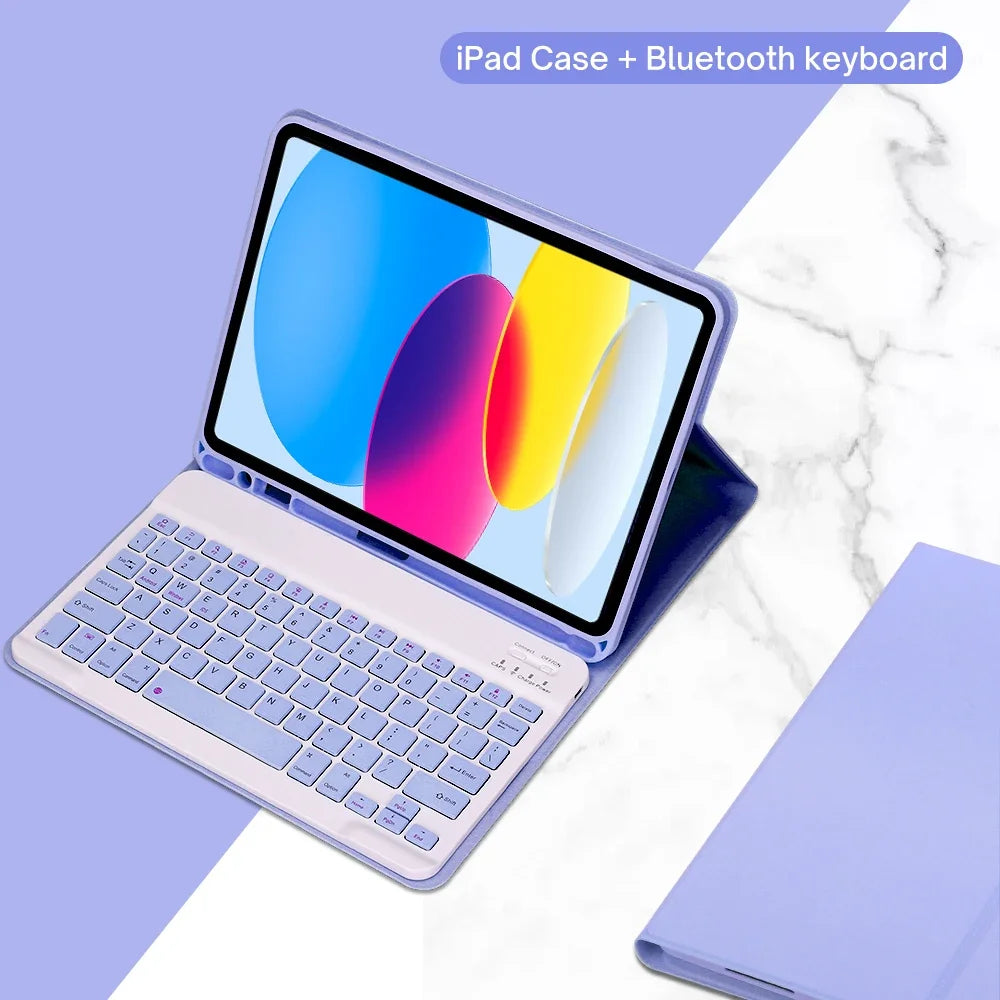 A pink iPad case is shown open with a detachable Bluetooth keyboard resting beside it on a white marble surface.