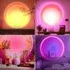 A collection of three vibrant pink and orange light installations on a desk, a wall, and a bed.