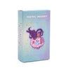 A box of Pastel Journey Tarot Deck & Guidebook featuring a purple-haired figure.