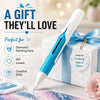 A white and blue automatic diamond painting bead dispenser pen is shown next to a gift box.