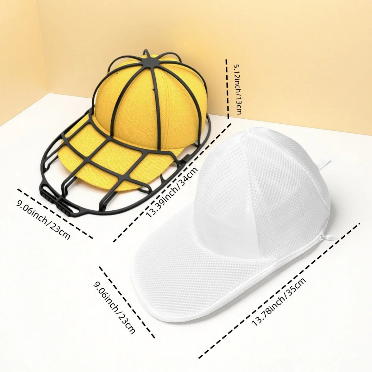 A yellow mesh bag hat cleaning cage with a black frame is shown next to a white baseball cap.