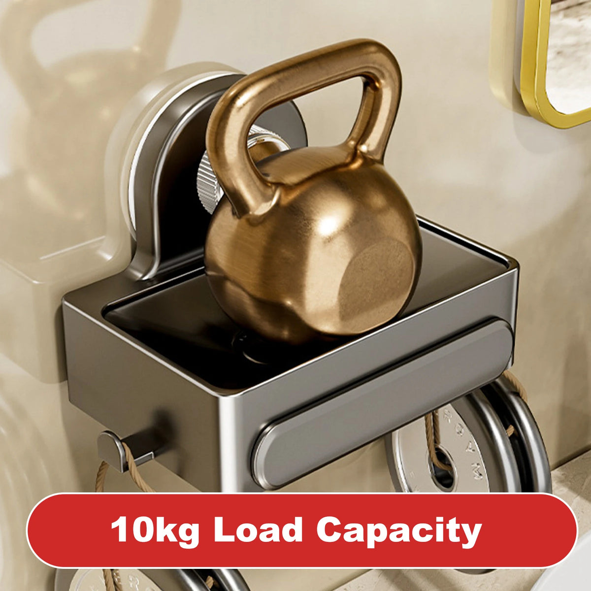 A brass-colored gym weight is mounted on a chrome wall-mounted soap dish with a drain tray.
