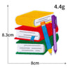 A stack of ten iron-on patches featuring colorful books and pens.