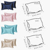 A set of two silky satin pillowcases in various shades including navy blue, pink, light blue, and beige.