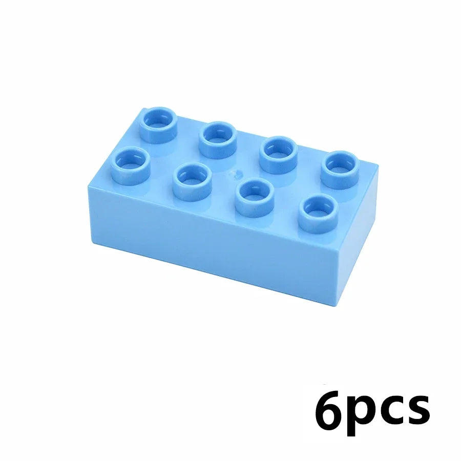 A set of six light blue building blocks or connectors arranged in a rectangular shape.