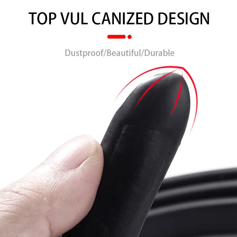 A hand is holding a black car door edge protector strip, highlighting its durable and dustproof design.