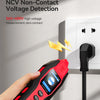 A hand holds a red and black voltage detection device against a white electrical outlet.