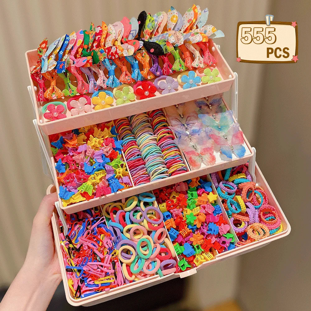 A pink storage box filled with a variety of colorful butterfly hair accessories for girls