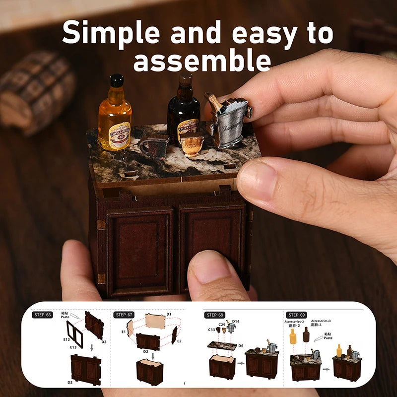 Hands assemble a wooden dollhouse miniature kit featuring dark wood and small glass bottles.