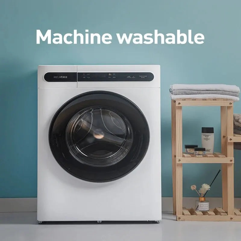 White washing machine with a door open, labeled as machine washable.