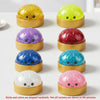 A collection of eight glitter dome squeeze toys in various colors including gold, lime green, purple, red, blue, silver, and 