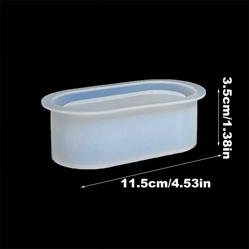 A translucent silicone mold shaped like a rectangular planter, with dimensions 11.5cm long and 3.5cm high.