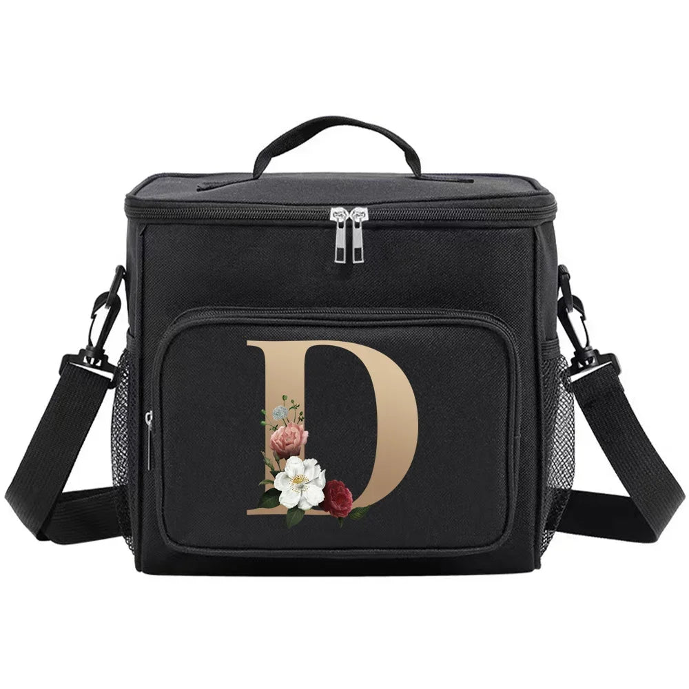 Black insulated canvas lunch bag with a gold initial D and floral accents