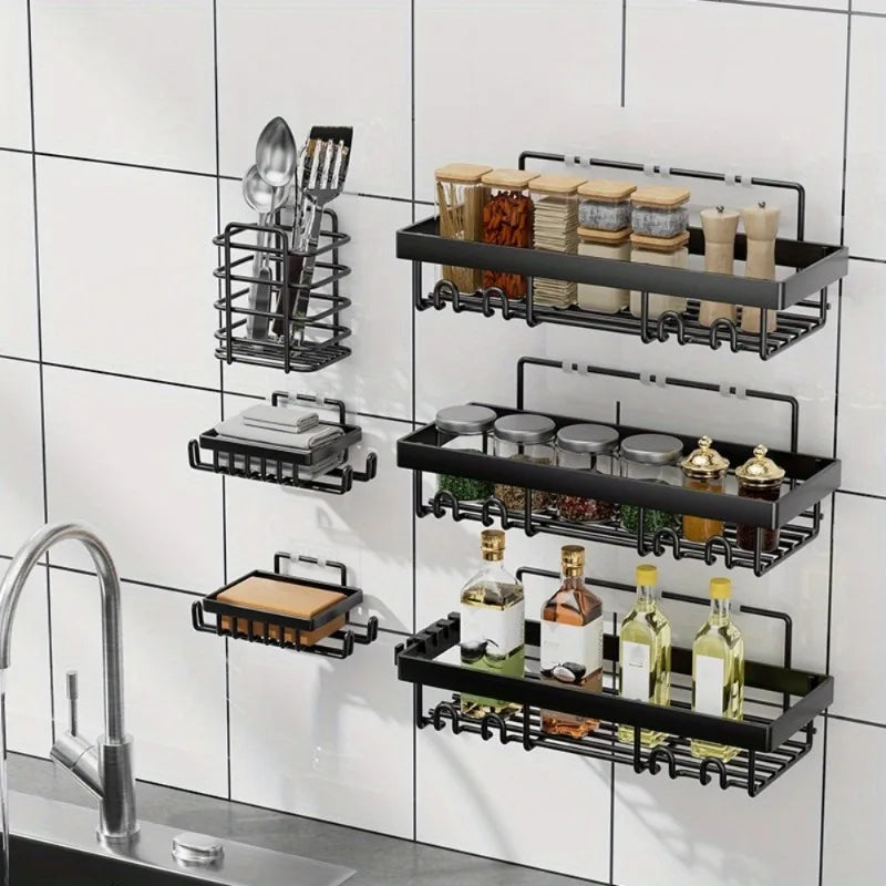 Black adhesive wall-mounted shower shelves with various organizers for bathroom storage