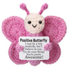 Handmade crochet butterfly doll in pink with a positive message card