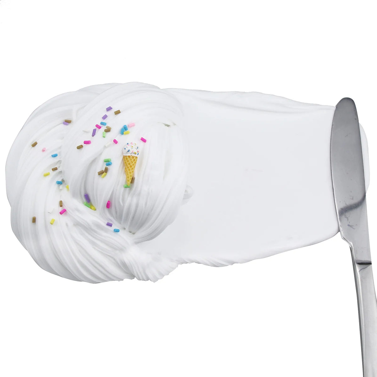 A white slime product is shown on a spatula, decorated with colorful sprinkles and a miniature ice cream cone.