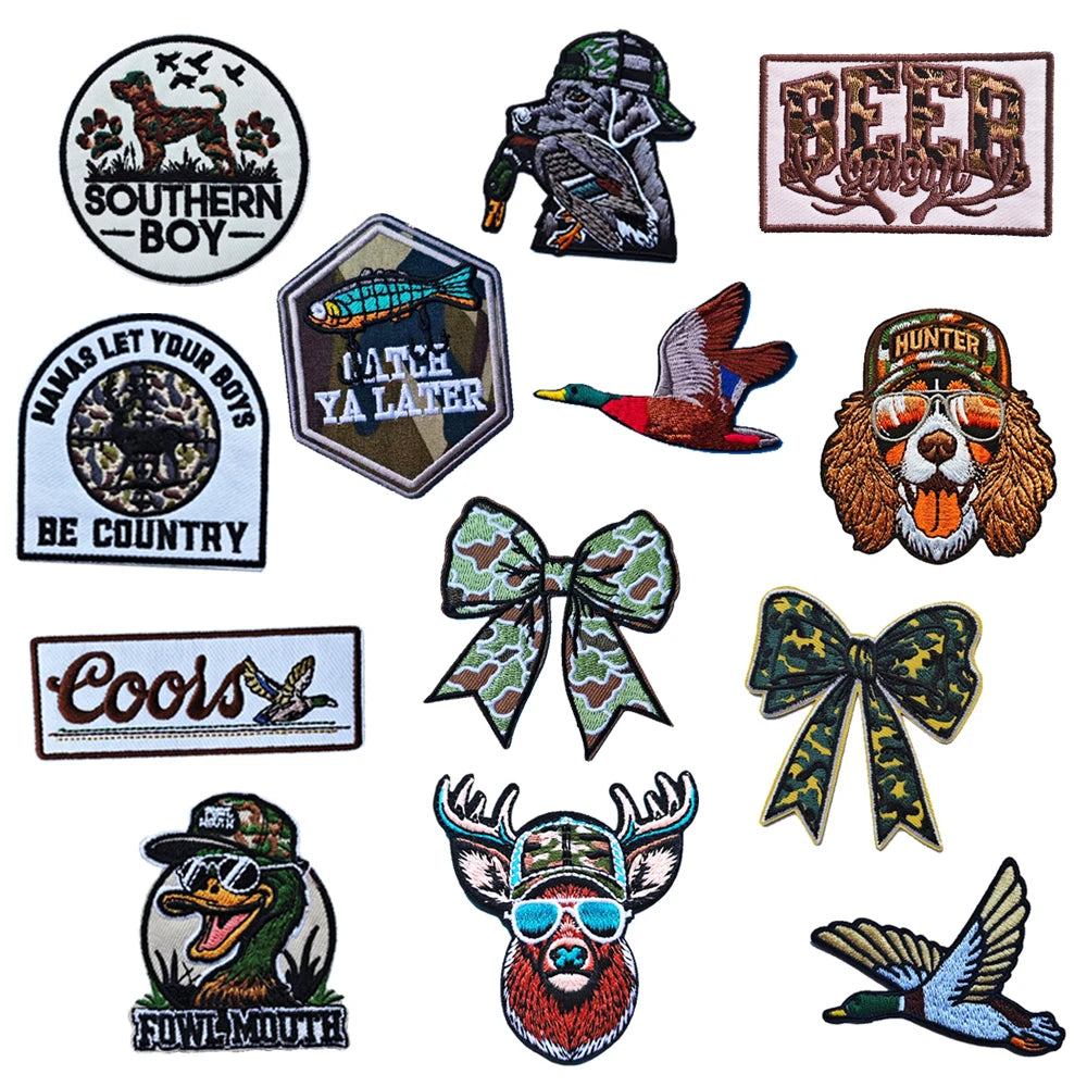 A collection of embroidered hunting patches featuring various animals and themes like a Southern Boy, a hunter, and a fowl-mo