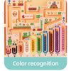 A magnetic maze logic puzzle board featuring various colored blocks and pathways for color recognition.