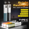 A set of bright flashlight devices, including a vertical and a compact Type-C rechargeable model, are displayed on a dark sur
