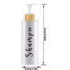 White refillable shampoo and lotion dispenser bottle with a wooden pump top