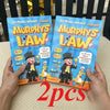 Two copies of Murphy's Law comic books are held by hands, featuring illustrations of characters and life wisdom.