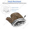 Leopard print oven gloves featuring a multi-layer lining for heat resistance and protection.