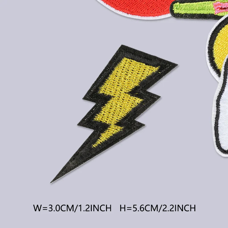 Black lightning bolt iron-on embroidered patch with yellow detailing