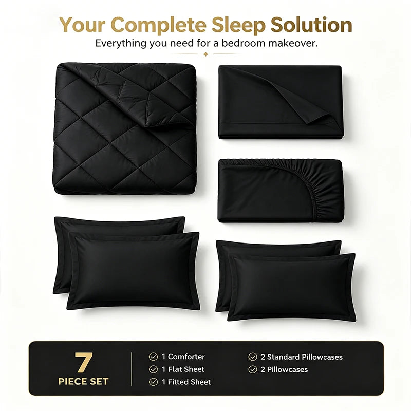 Komplettes Schlafanzug-Set in Schwarz, bestehend aus Decke, Bettlaken und Kissenbezügen.