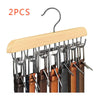 A wooden belt organizer rack with 14 metal hooks is shown, featuring multiple leather straps.