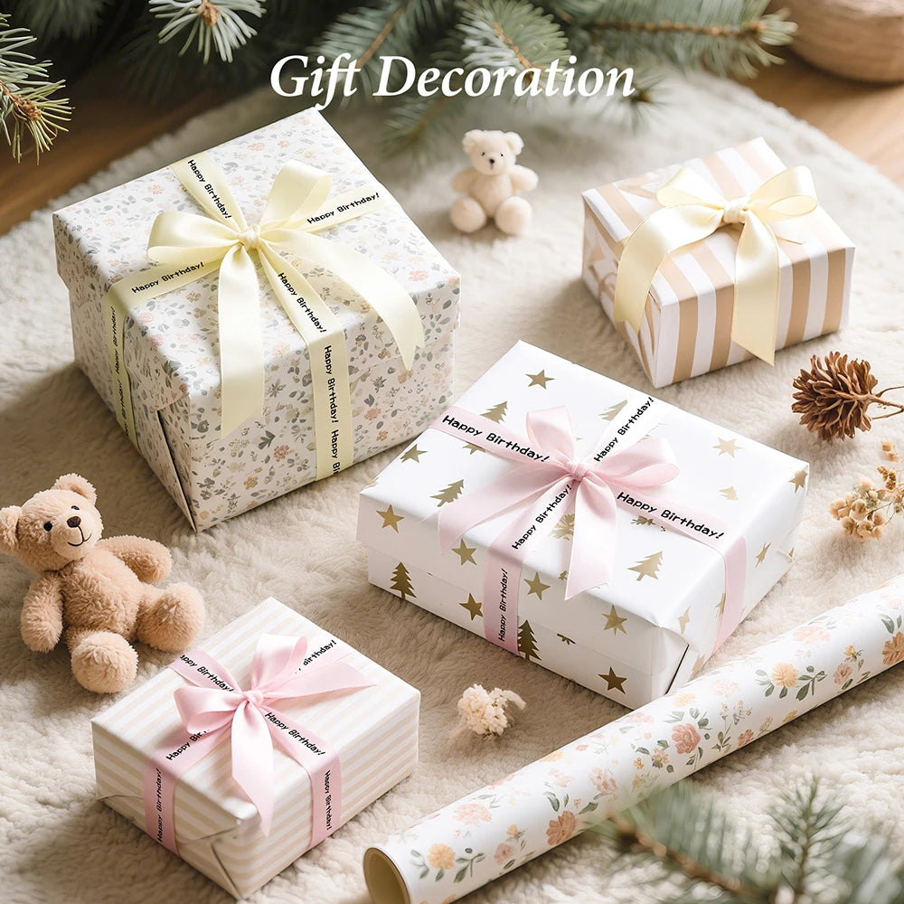 Gift decoration featuring wrapped presents with satin ribbon labels and small teddy bears on a soft background.