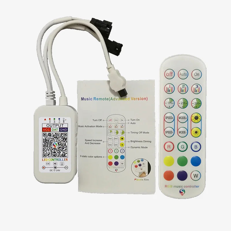 A white Bluetooth LED strip controller unit with a detachable remote and an accompanying plastic filter.