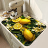 A yellow lemon print absorbent kitchen drying mat featuring lemons and green leaves.