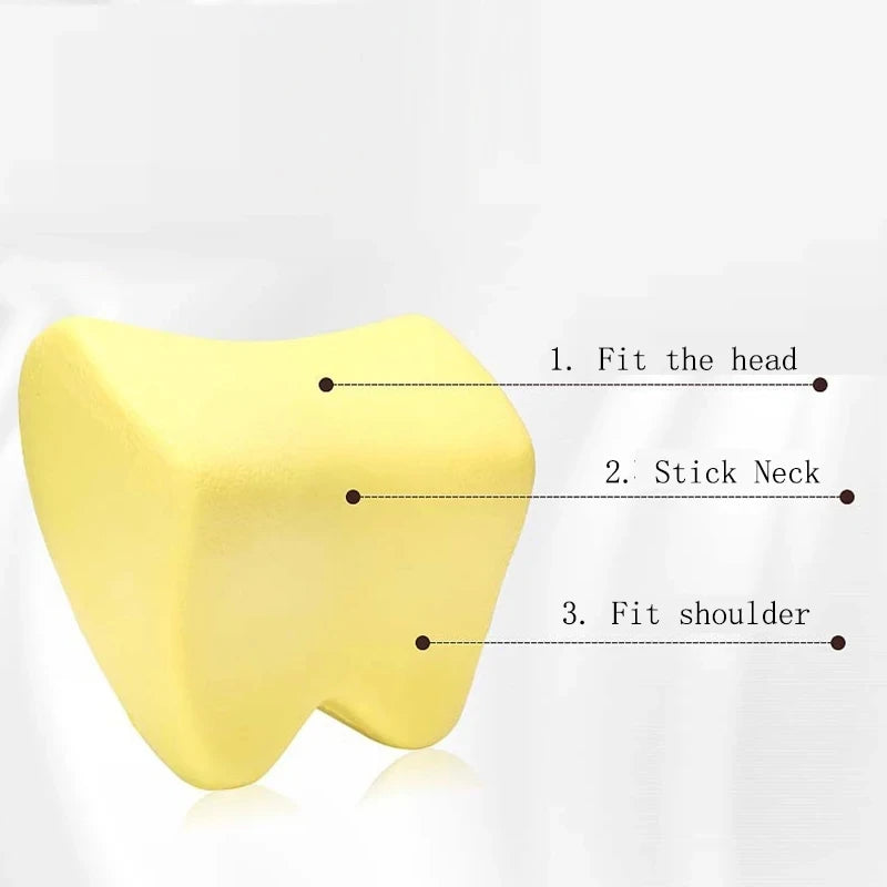 Yellow memory foam car headrest neck pillow showing fitting points for the head, neck, and shoulder.