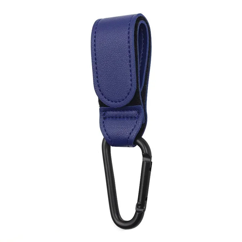 A dark blue PU leather baby bag organizer with a hook for strollers.