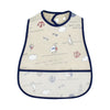 A beige waterproof baby feeding bib with a catch pocket and various sea-themed illustrations.