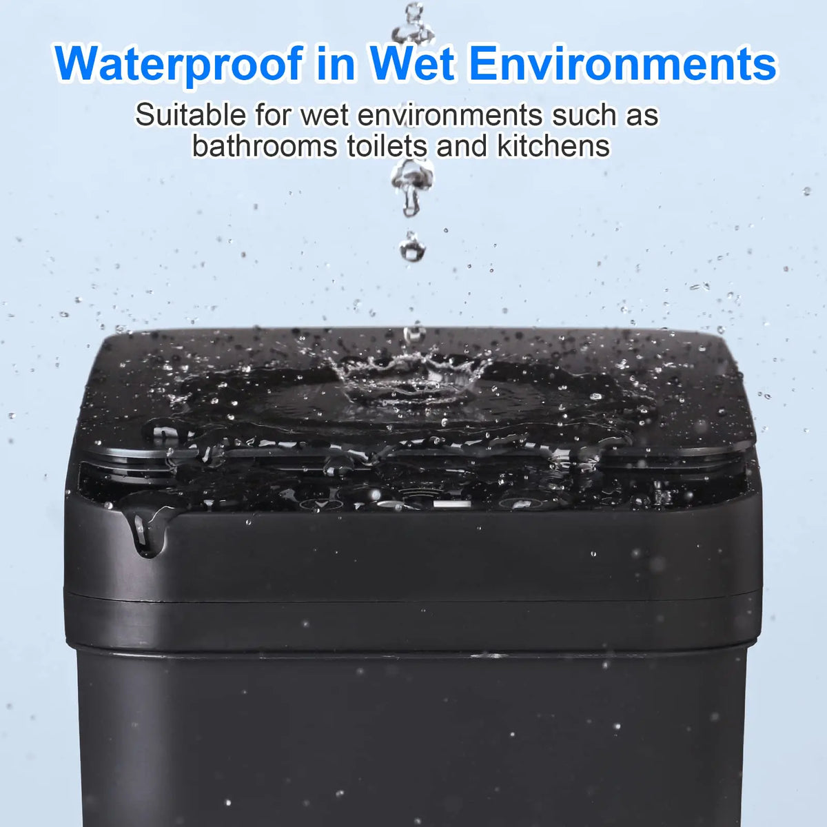 A black slim touchless trash can is shown with water droplets splashing onto its lid.
