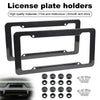Black carbon fiber license plate holders with mounting screws shown next to a car grille.