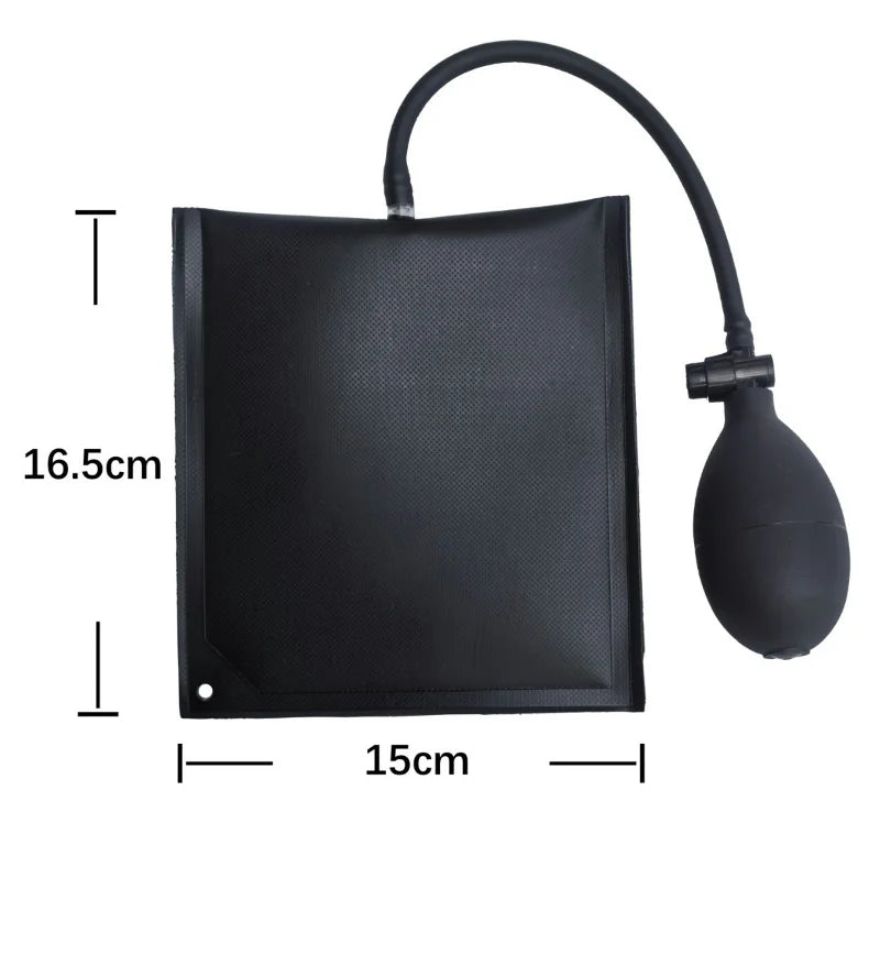 Black inflatable air wedge tool with a flexible hose for car door and window repair